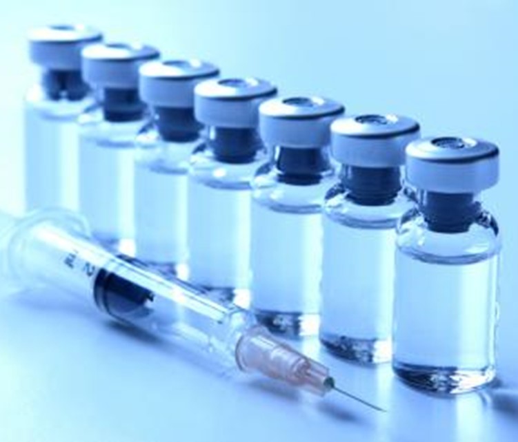 Vaccination supplies bottles and needle