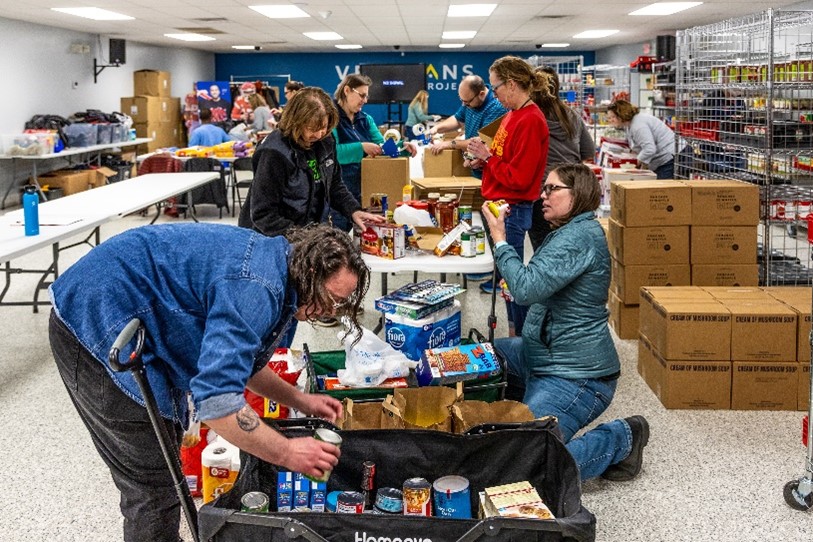 Volunteers serve at the veterans community project.