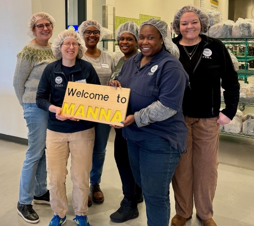 Volunteers serve at a food bank.