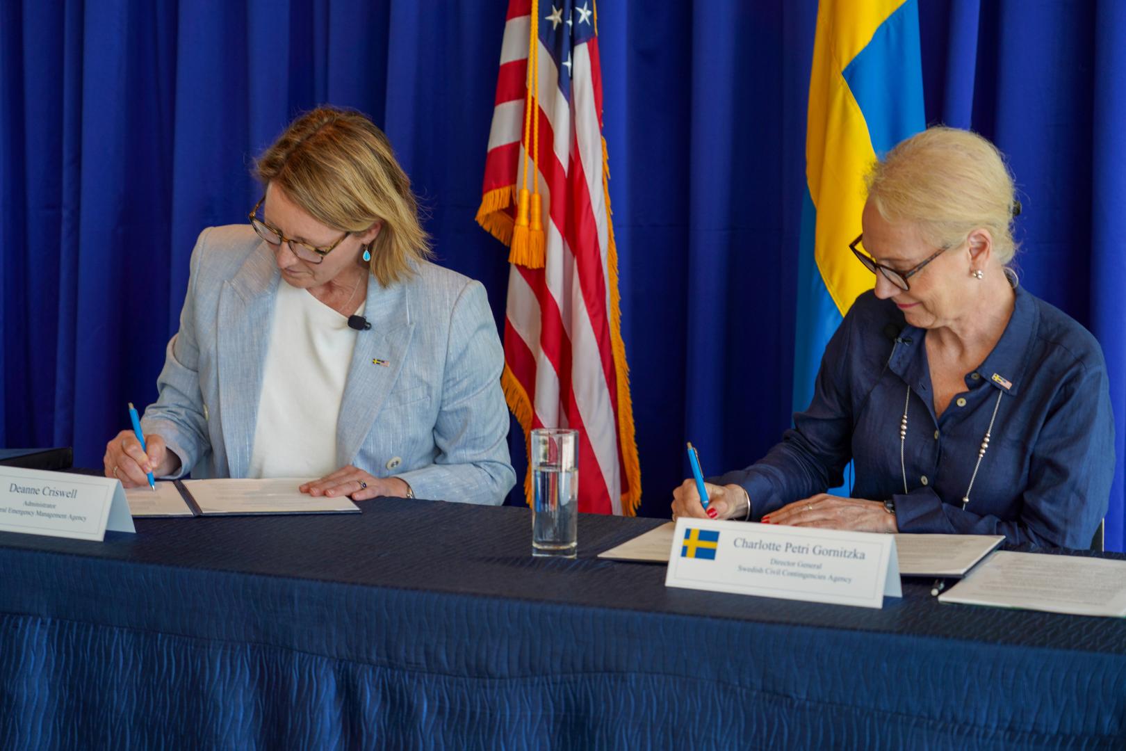 FEMA Administrator Deanne Criswell and Director General of the Swedish Civil Contingencies Agency Charlotte Petri Gornitzka sign a Memorandum of Understanding at The Swedish embassy in Washington, D.C. 