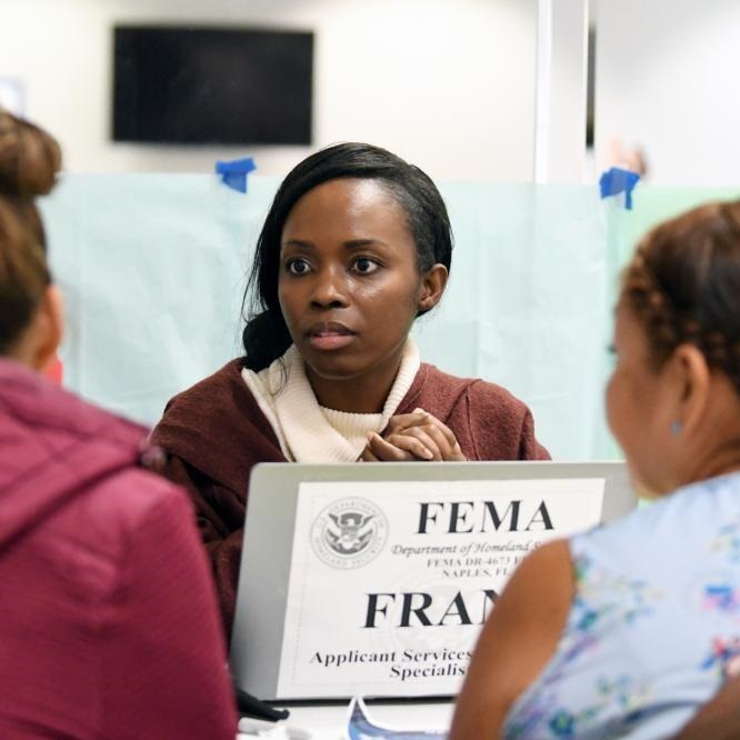 Residents visit a Disaster Recovery Center in Collier County at Veterans Community Park. Local, state and federal agencies are on site to help survivors affected by Hurricane Ian.