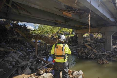 Caption: Haywood County, N.C. - (Oct. 3, 2024) - Eastern Band of Cherokee's Fire and Rescue along with FEMA Urban Search and Rescue's Massachusetts Task Force 1 and other local responders conduct a recovery operation in Clyde, Haywood County, North Carolina, on Tuesday, October 2, 2024.