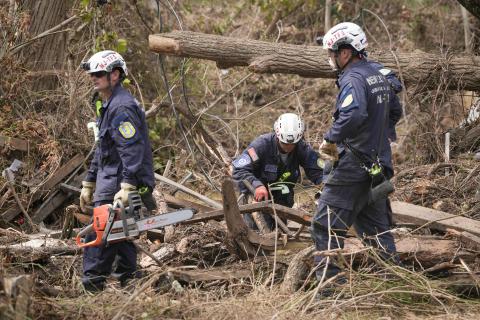 Caption: Asheville, N.C. (Oct. 4, 2024) - Members of the New Jersey Task Force 1 Urban Search and Rescue Team conduct operations across Buncombe County in Asheville, North Carolina, on Friday, October 4, 2024.