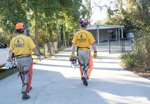 Caption: Statesboro, Ga. (Oct. 12, 2024) - Volunteers from a disaster relief group clear debris from Hurricane Helene.