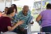 A elderly man receives orientation during a hurricane preparedness event
